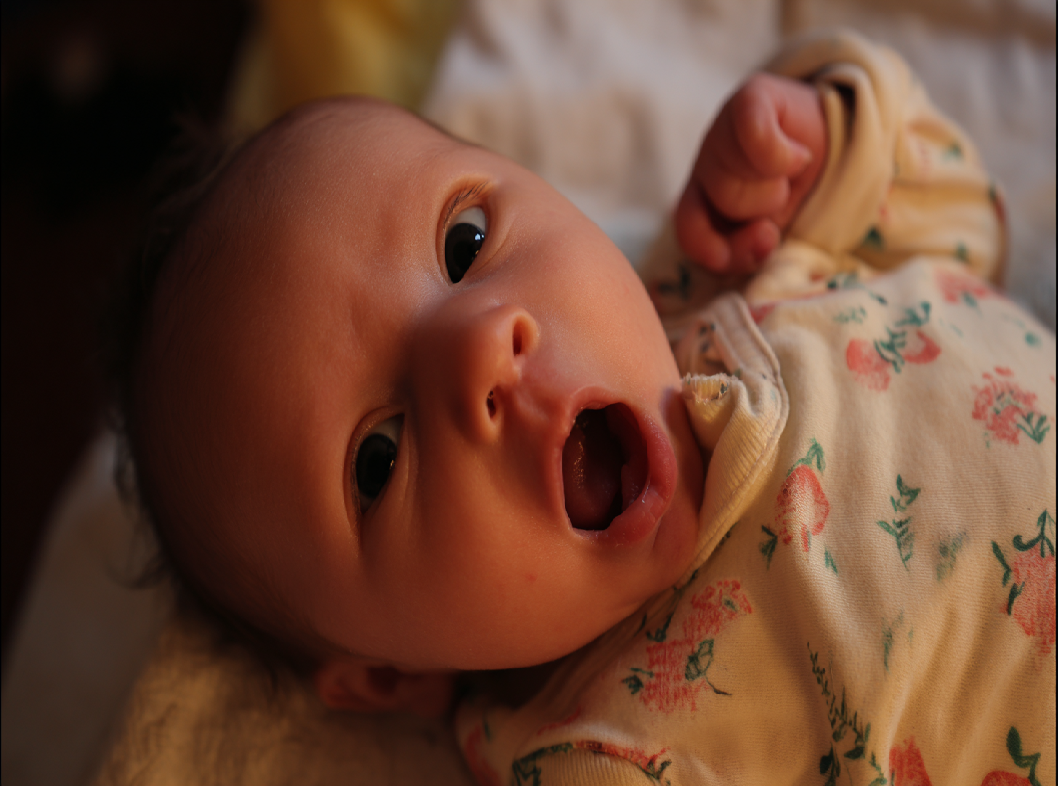 Младенец срыгивает после кормления